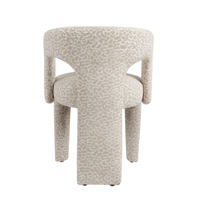 Liana – Gestoffeerde designstoel met leopard motief en sculpturale vormen